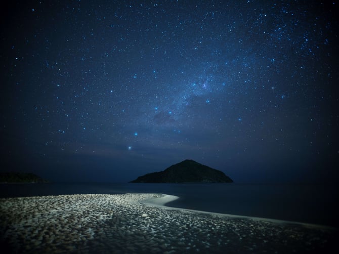 stargazing on private island moon lit beach