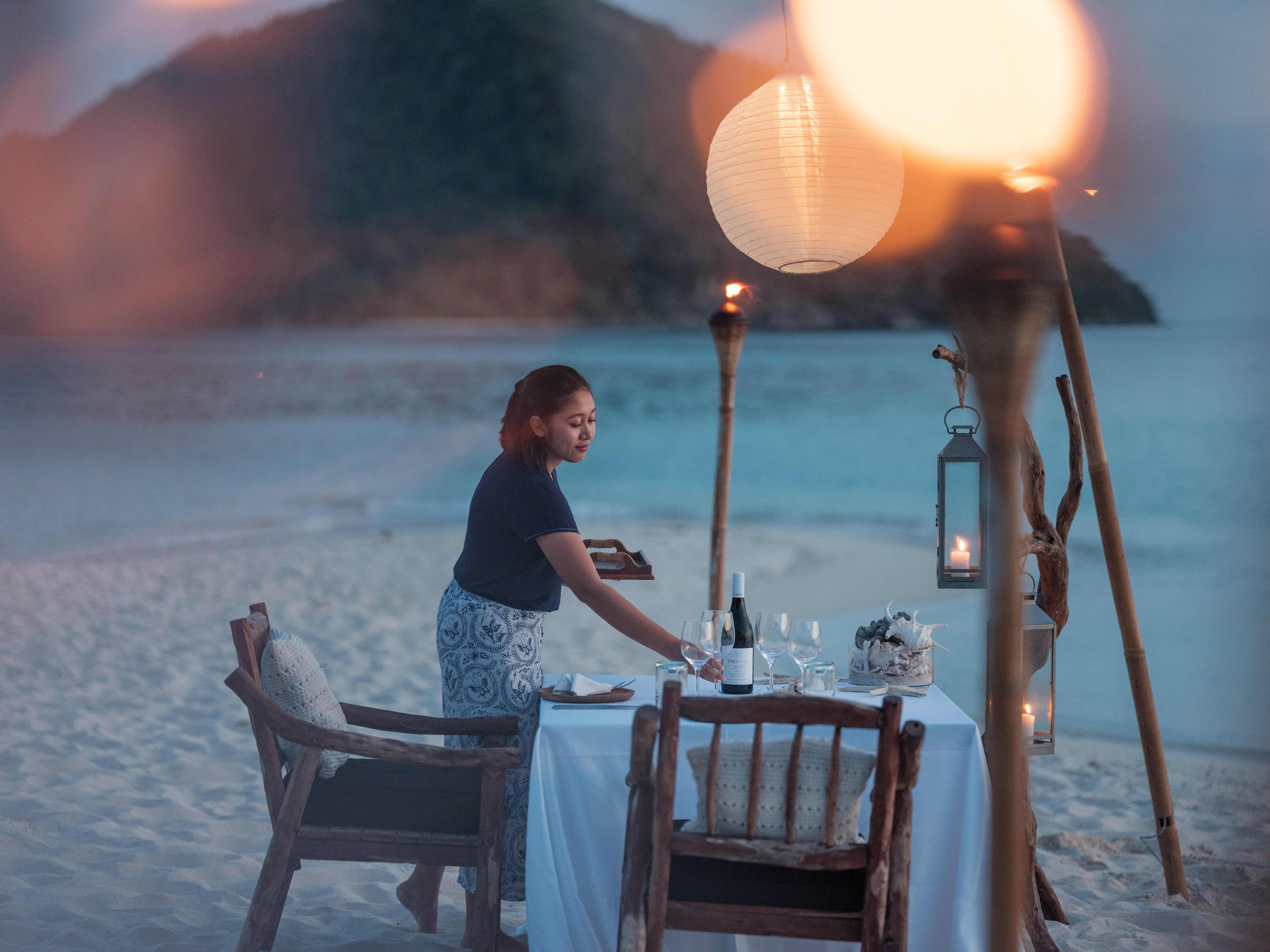 Private dining on the beach at Bawah Reserve, Indonesia