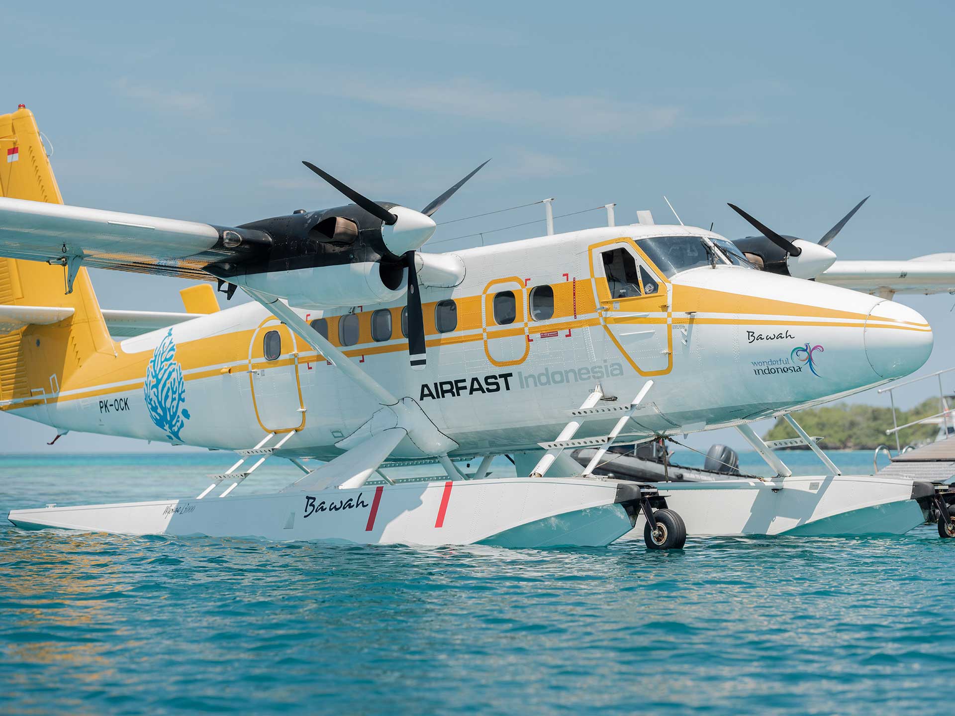 Seaplane  twin otter amphibious floatplane to Bawah Reserve Indonesia