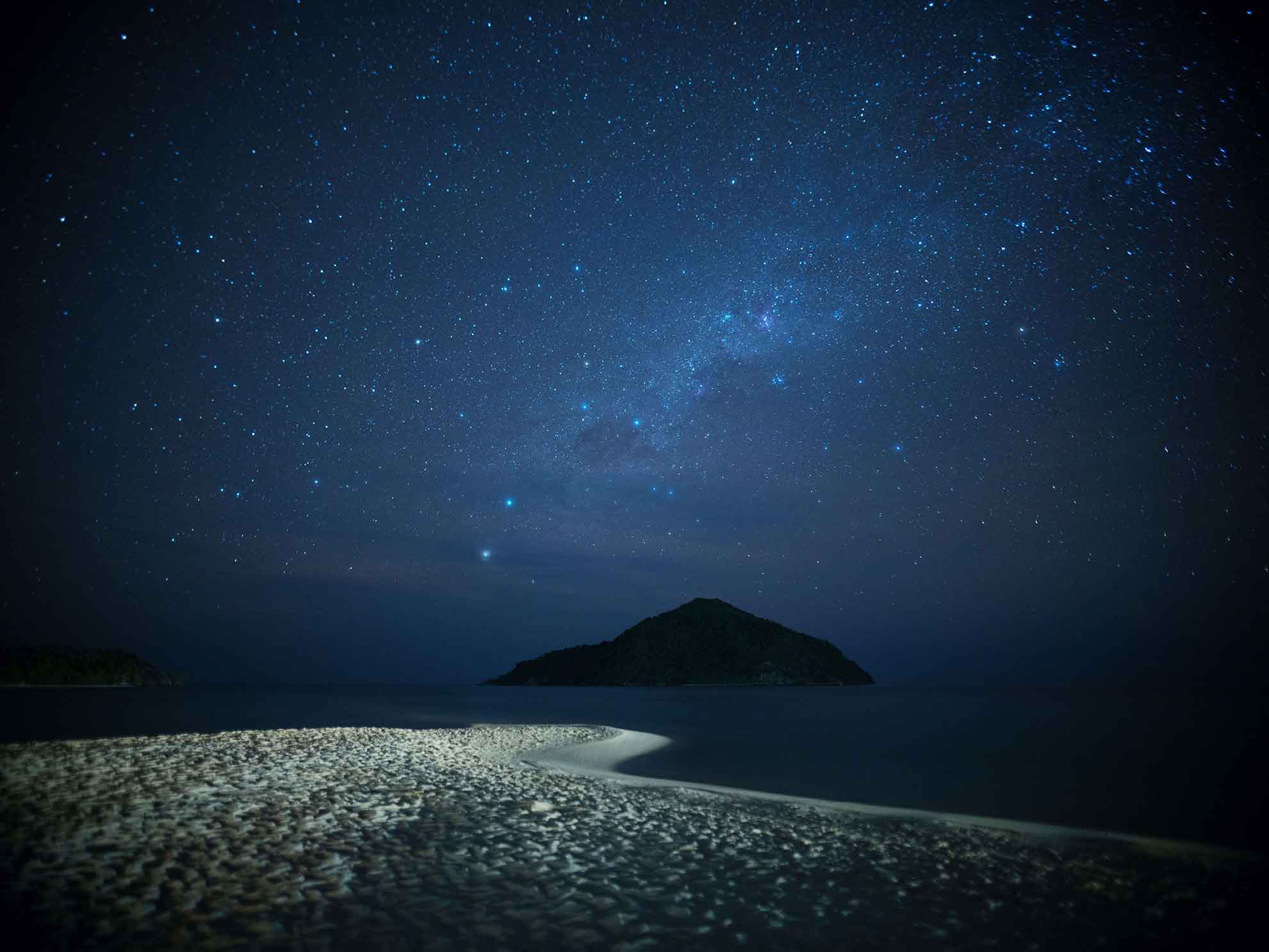 Beautiful starry night over private island, Stargazing at Bawah Reserve, Indonesia