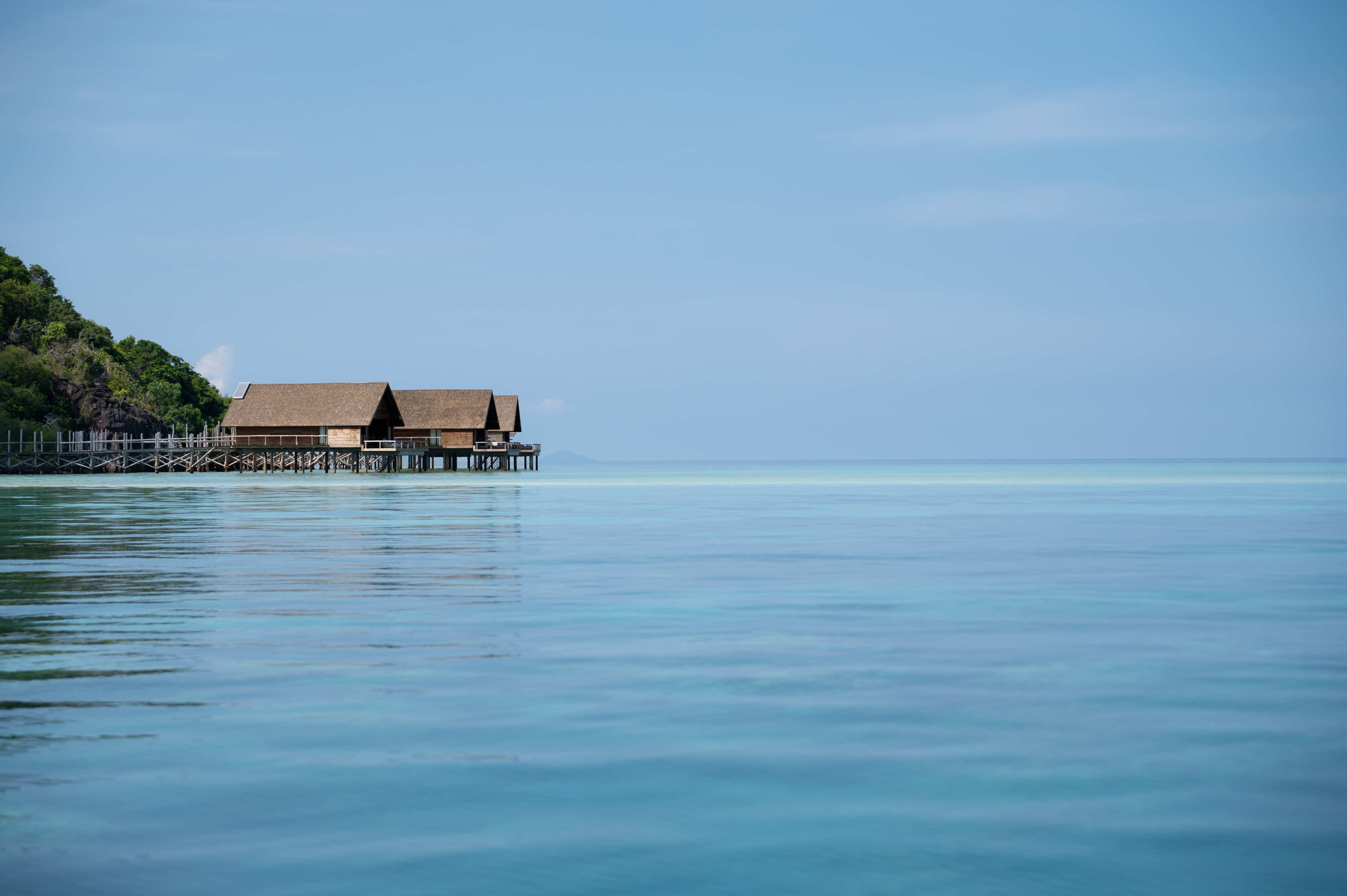 Overwater bungalows vs Pool villas at Bawah Reserve, Indonesia